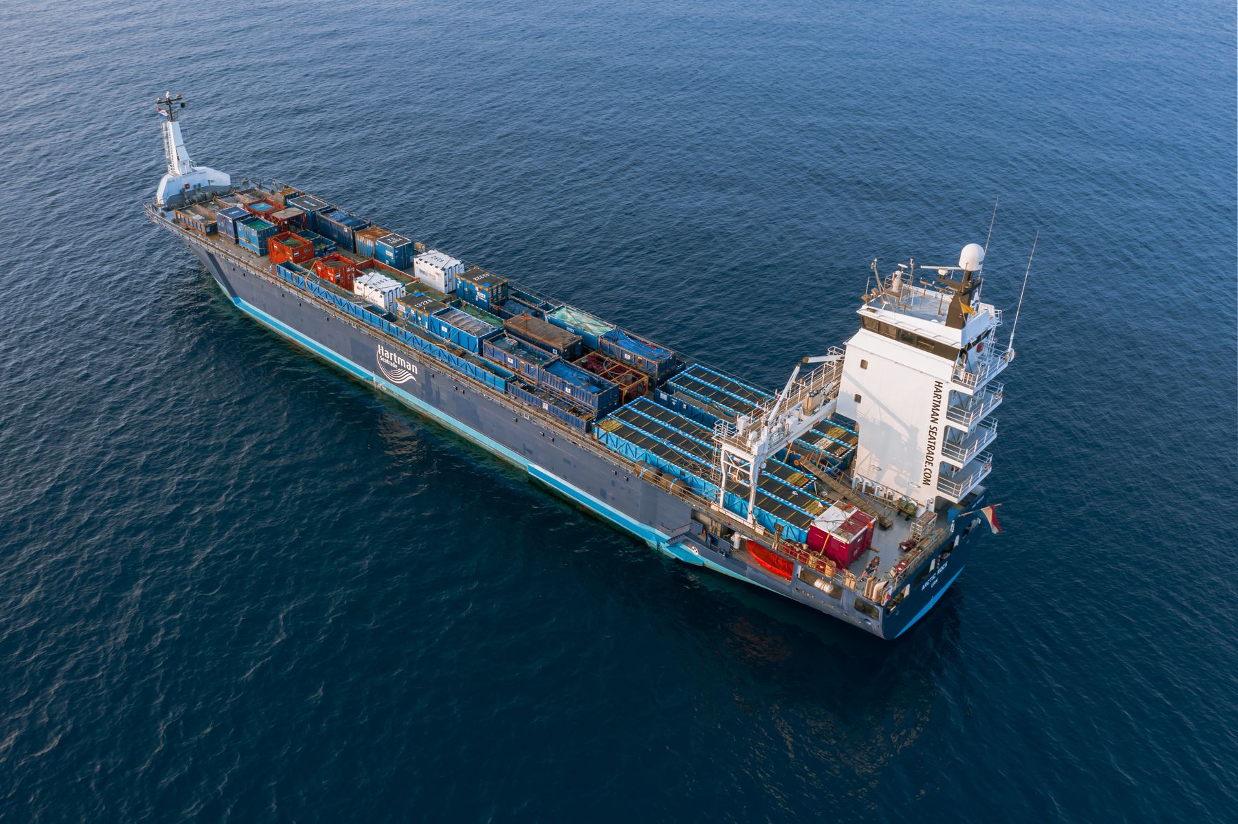 Container ship at sea carrying export cargo